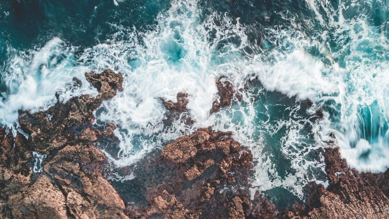 water splashing onto rock
